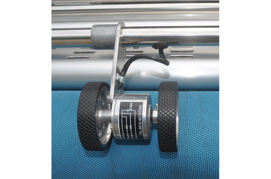 富怡吹風(fēng)式自動對邊松布機(jī)